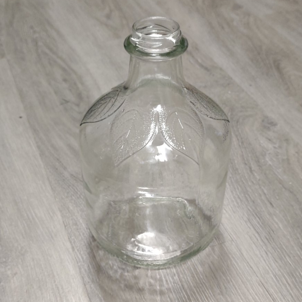 Pretty glass bottle to reuse or craft